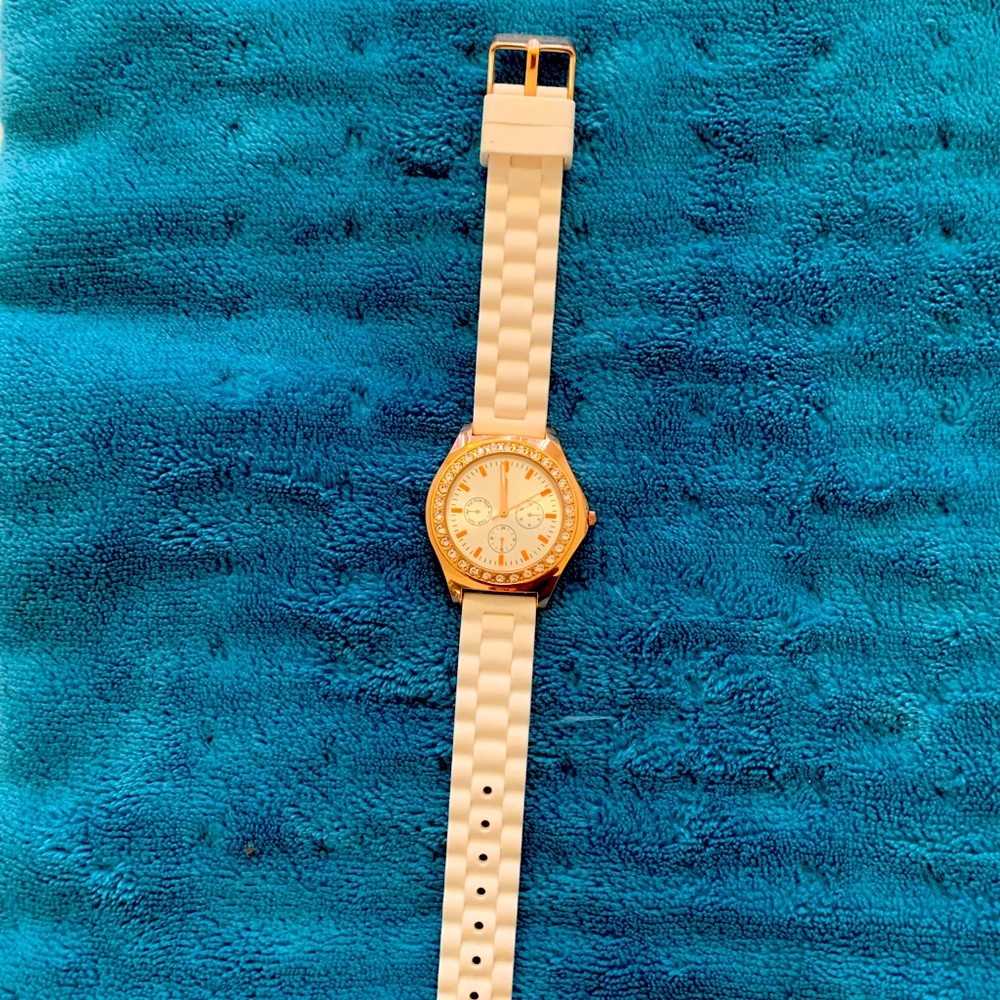 Claire’s white crystal watch